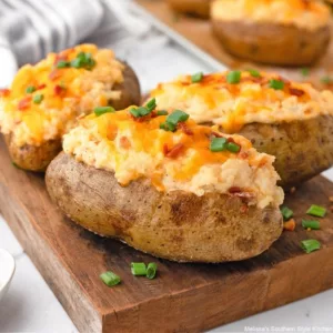 Pommes de terre farcies et fondue de fromage à la truffe d'été